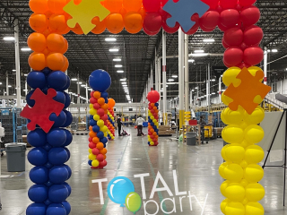Autism awareness square balloon arch in Amazon warehouse