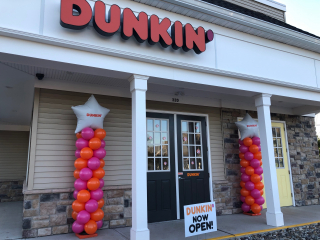 Dunkin Donuts grand opening balloon columns with logo personalization custom balloons