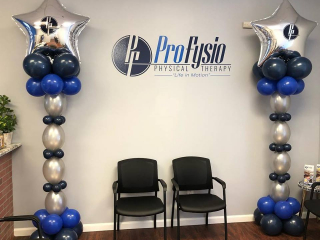 ProFysio grand opening balloon columns physical therapy office